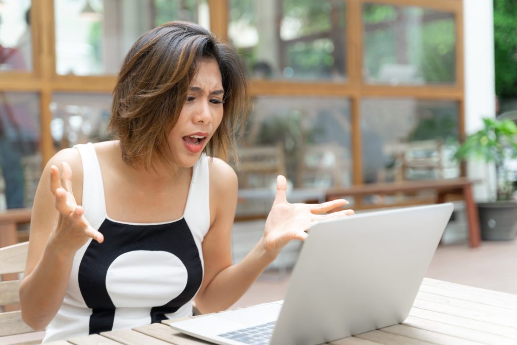 How To Appeal Or Resolve Disputes With Online Casinos In The Philippines 3 Working Woman Feeling Upset With Laptop
